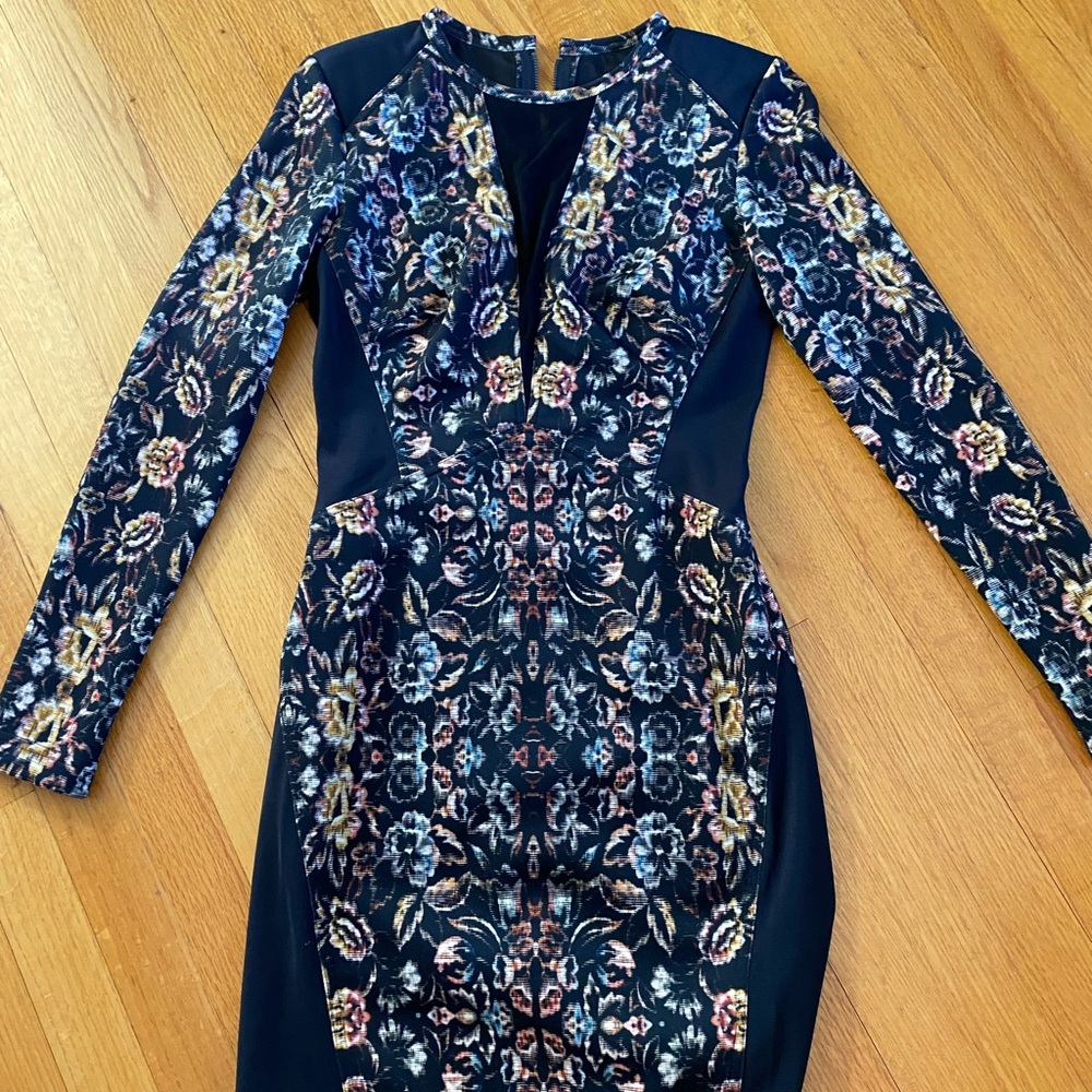 Flowered stretch fabric dress with a v sheer top